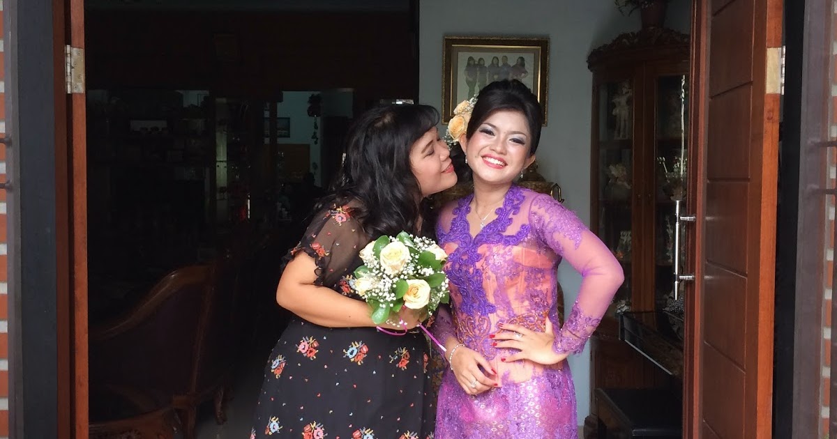 kebaya martumpol lilitan pinggang